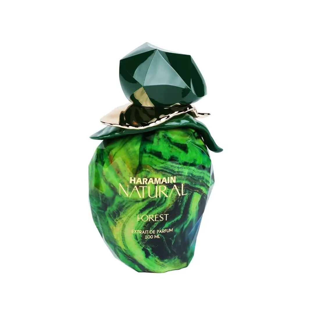 Haramain Natural Forest perfume bottle with green marbled design on a white background