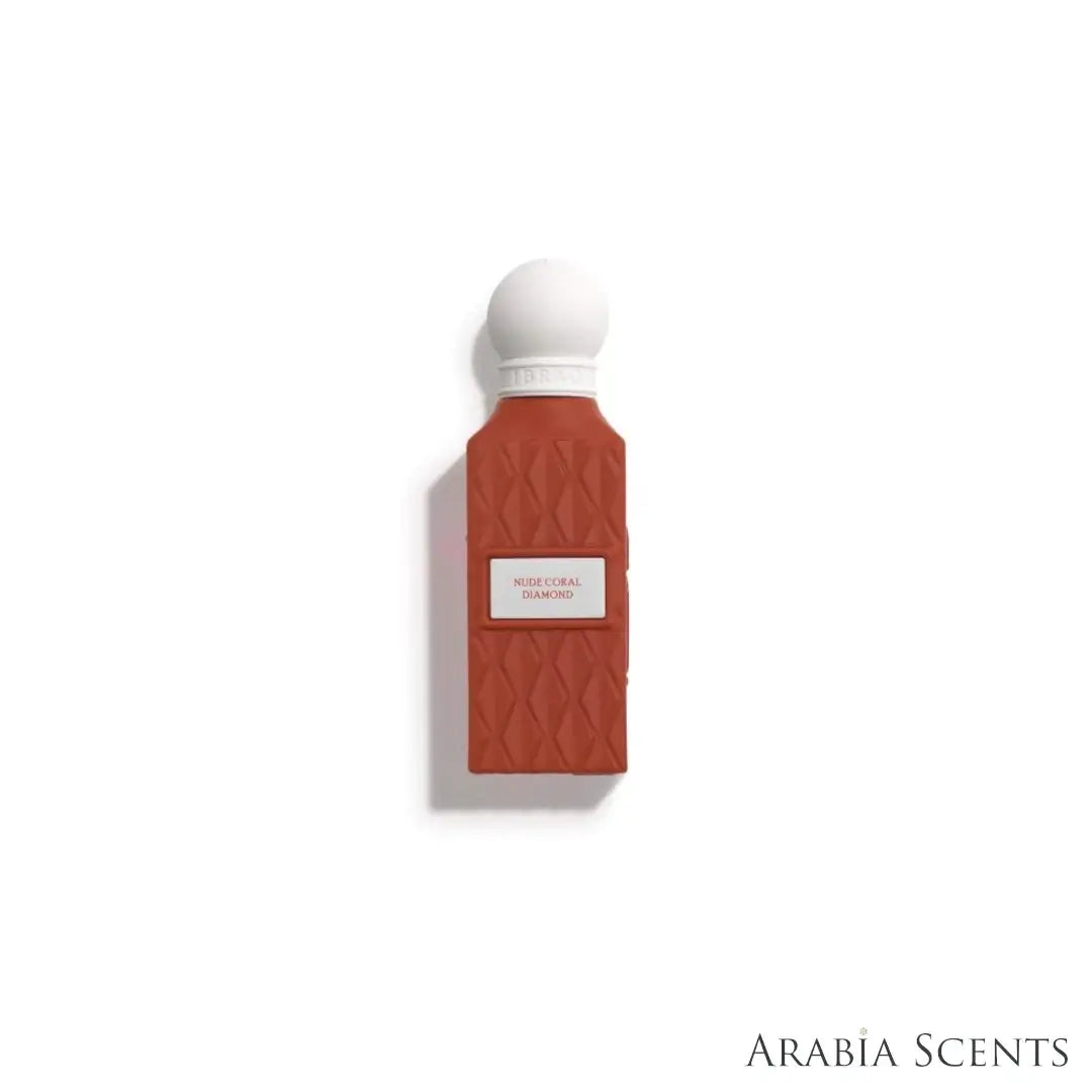 'Nude Coral Diamond' oil perfume bottle on a white background with 'IBRAQ' branding featured by 'Arabiascents'