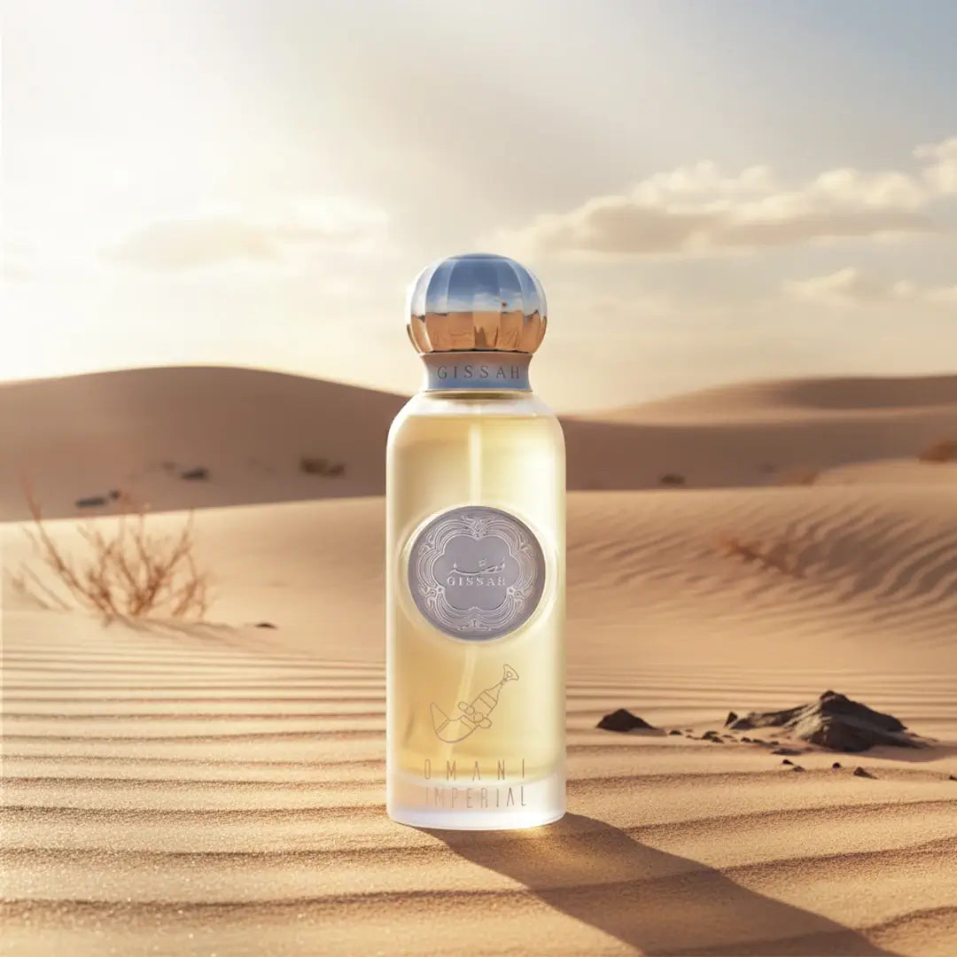 'Omani Imperial' Perfume bottle with a desert landscape in the background with Gissah branding