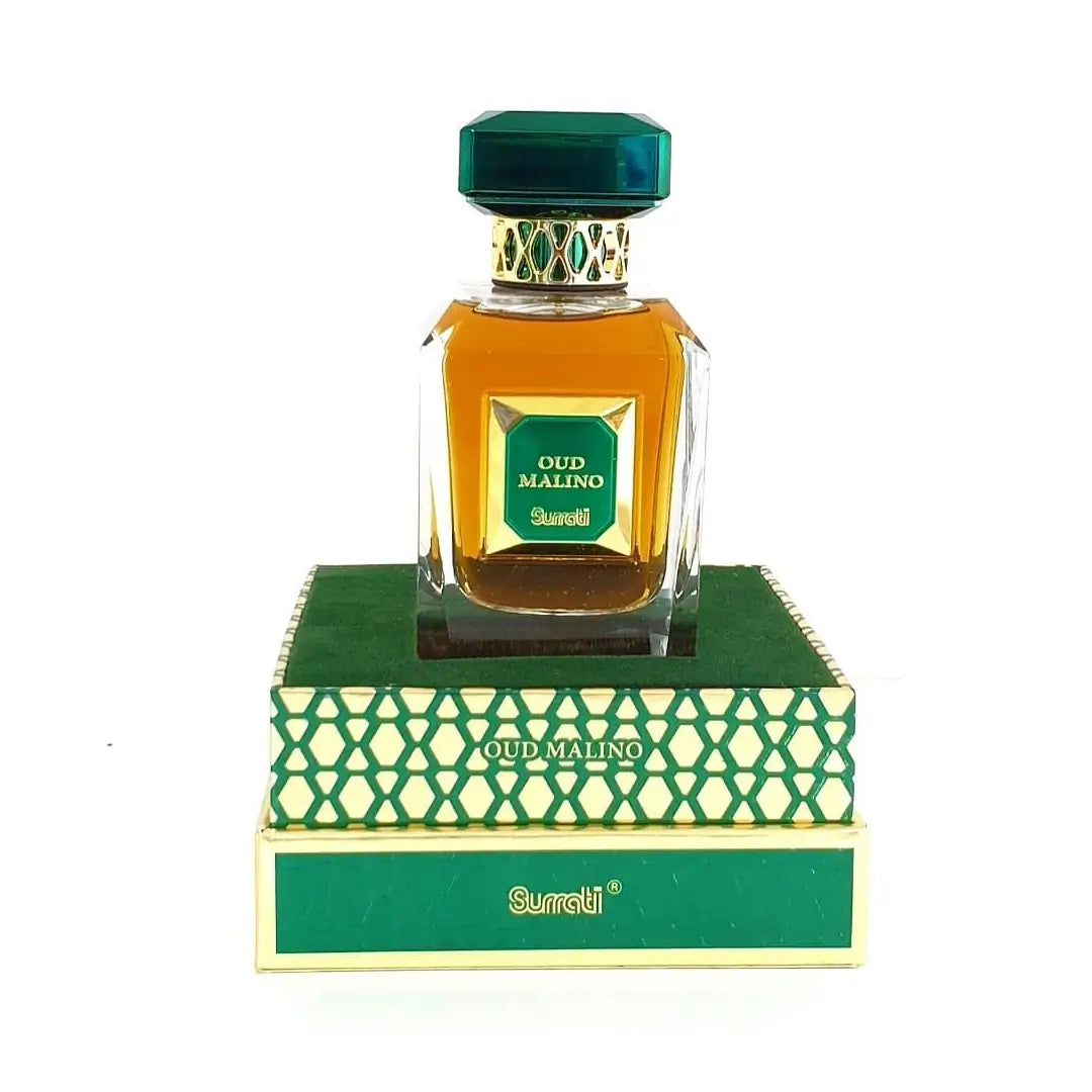 'Oud Malino' Perfume bottle with green cap and base on a white background with Surrati branding