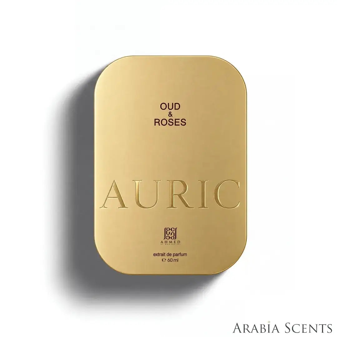 'Oud & Roses Auric' perfume packaging on a white background with 'Ahmed Al Maghribi' branding featured by 'Arabiascents'