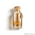 'Oud & Roses Auric' perfume bottle on a white background with 'Ahmed Al Maghribi' branding featured by 'Arabiascents'
