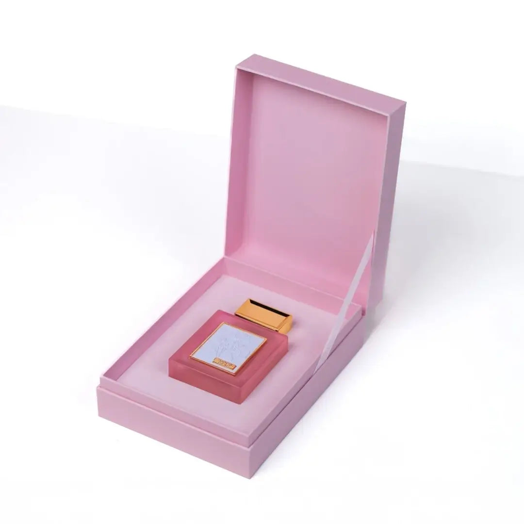 'Portrait Pink' perfume bottle & packaging in a white background with 'Oud Elite' branding
