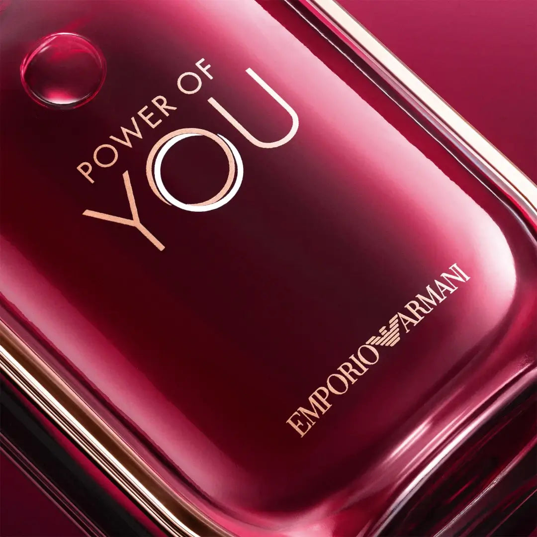 Red Emporio Armani perfume bottle with 'Power of You' label