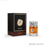 'Qumra' Perfume bottle and packaging with 'Le Bonheur' branding on a white background, featuring 'Arabia Scents'