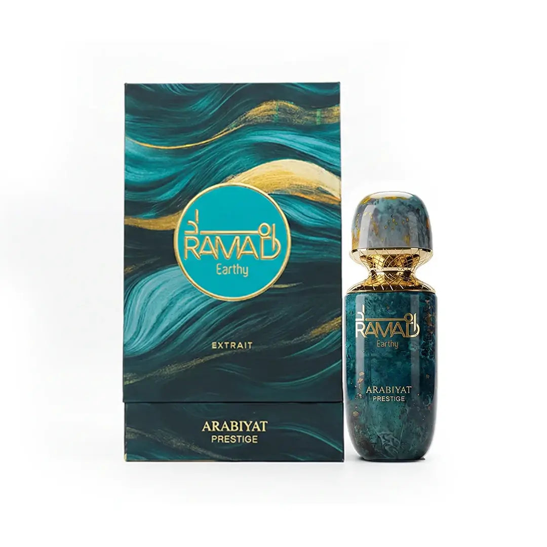 'Ramad Earthy' perfume bottle & packaging  in a white background with 'Arabiyat Prestige' branding