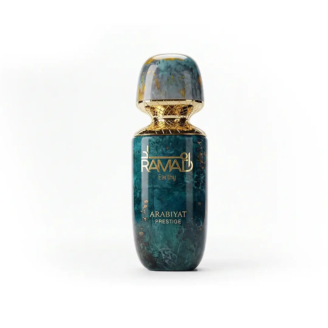 'Ramad Earthy' perfume bottle in a white background with 'Arabiyat Prestige' branding