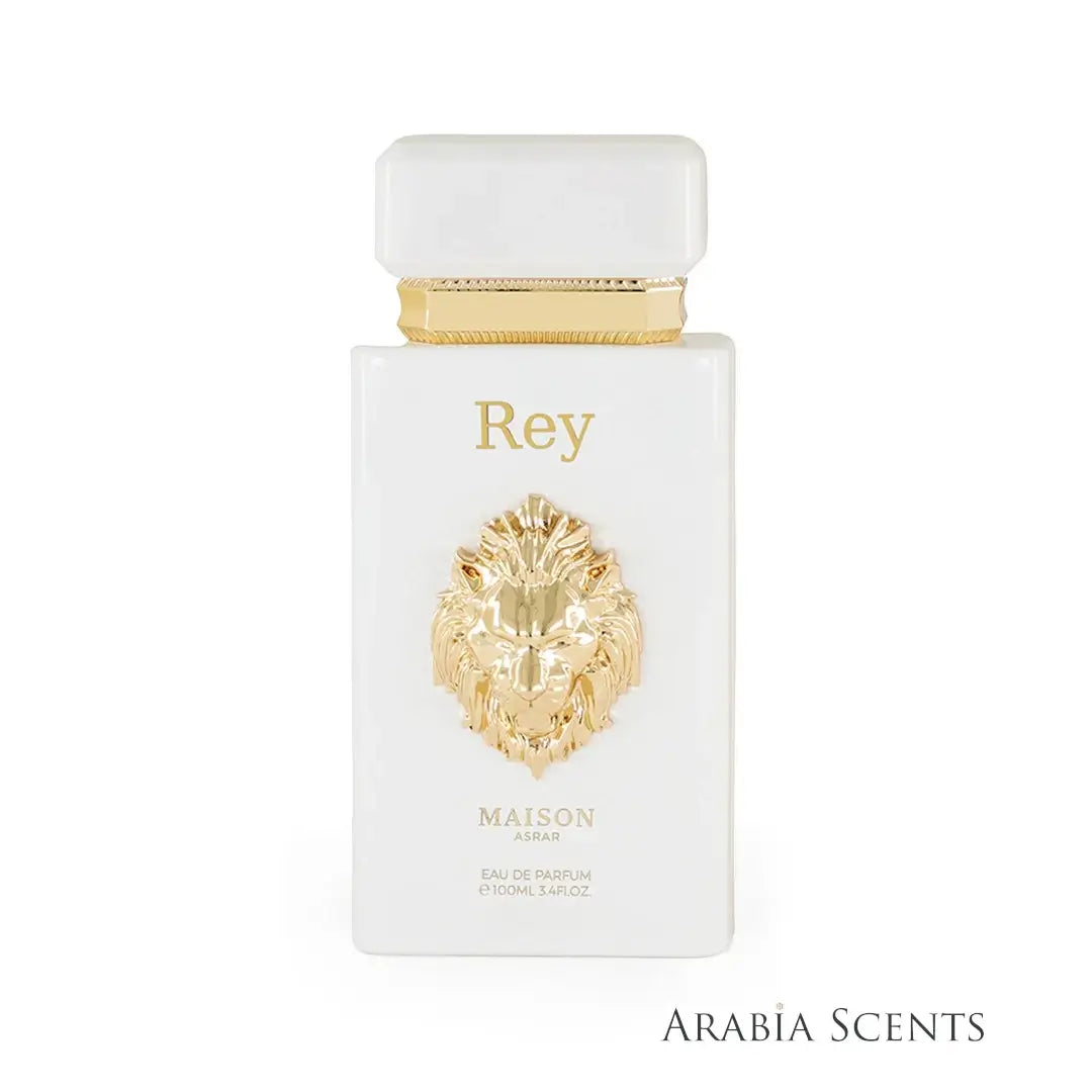 Perfume bottle labeled 'Rey' with gold lion emblem branded Maison Asrar on a white background, featured by 'ArabiaScents'.