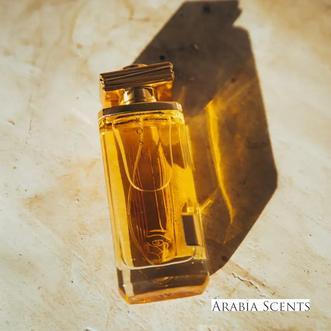 'Rose Honey' Perfume bottle with 'Maison Asrar' branding on a textured beige background featured by ArabiaScents