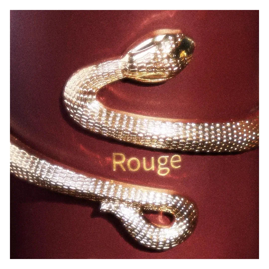 'Rouge' perfume bottle with 'Osma' branding