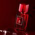 'Rouge' perfume bottle on a white background with 'Assaf' branding