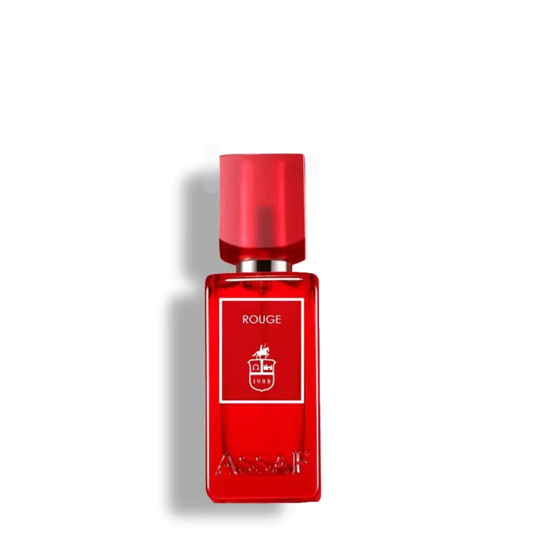 'Rouge' perfume bottle on a white background with 'Assaf' branding