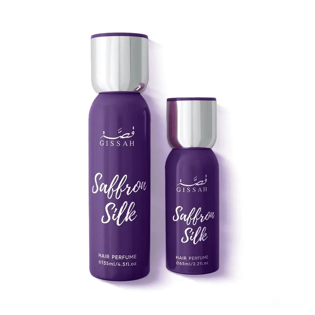 Gissah Saffron Milk hair mist bottles with silver caps on a white background