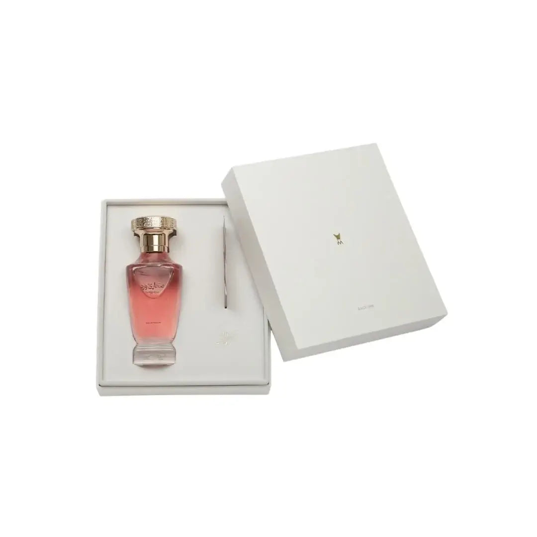 'Sahara Rose' Perfume bottle with pink liquid in a white box on a white background branded Al Majed Oud