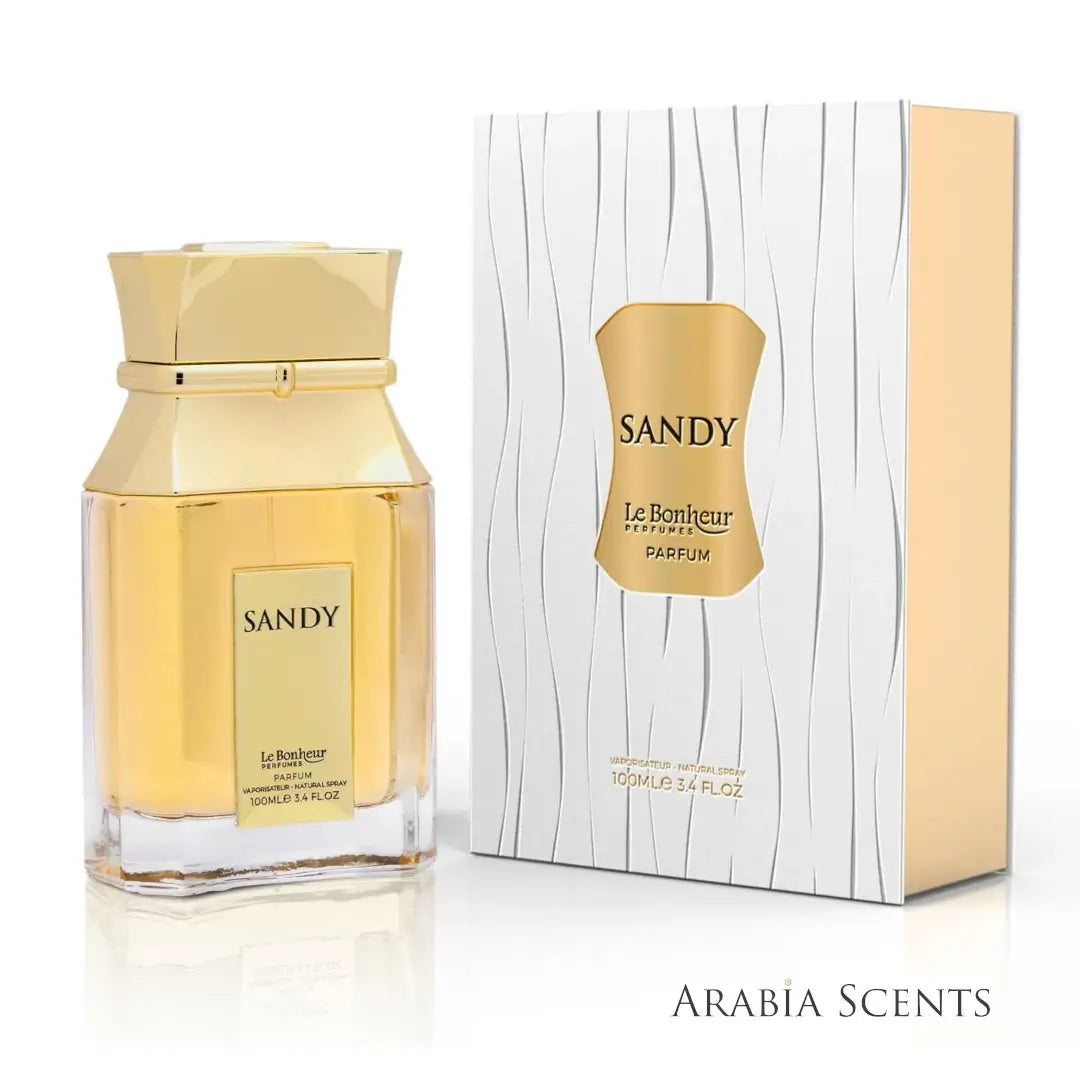 'Sandy' Gold perfume bottle and packaging with Le Bonheur branding on a white background featured by ArabiaScents