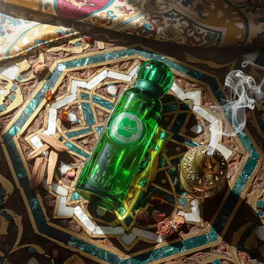 Green 'Saudi Imperial' perfume bottle on a decorative surface with intricate patterns with Gissah branding
