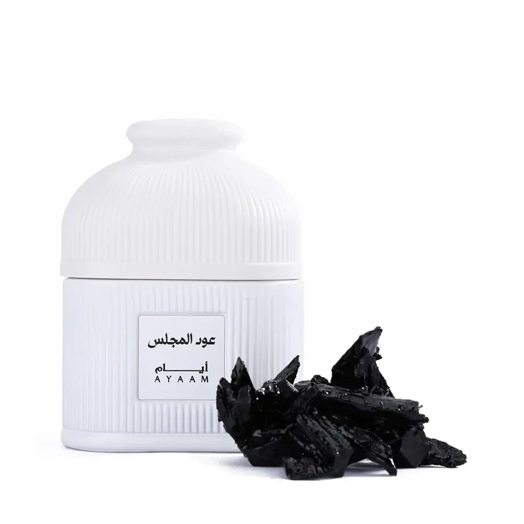 'Oud Il Majlis' bakhour bottle in a white background with 'Ayaam' branding