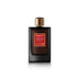 Perfume bottle labeled 'Oudacity Shadow Wood' on a white  Abdul Samad Al Qurashibackground