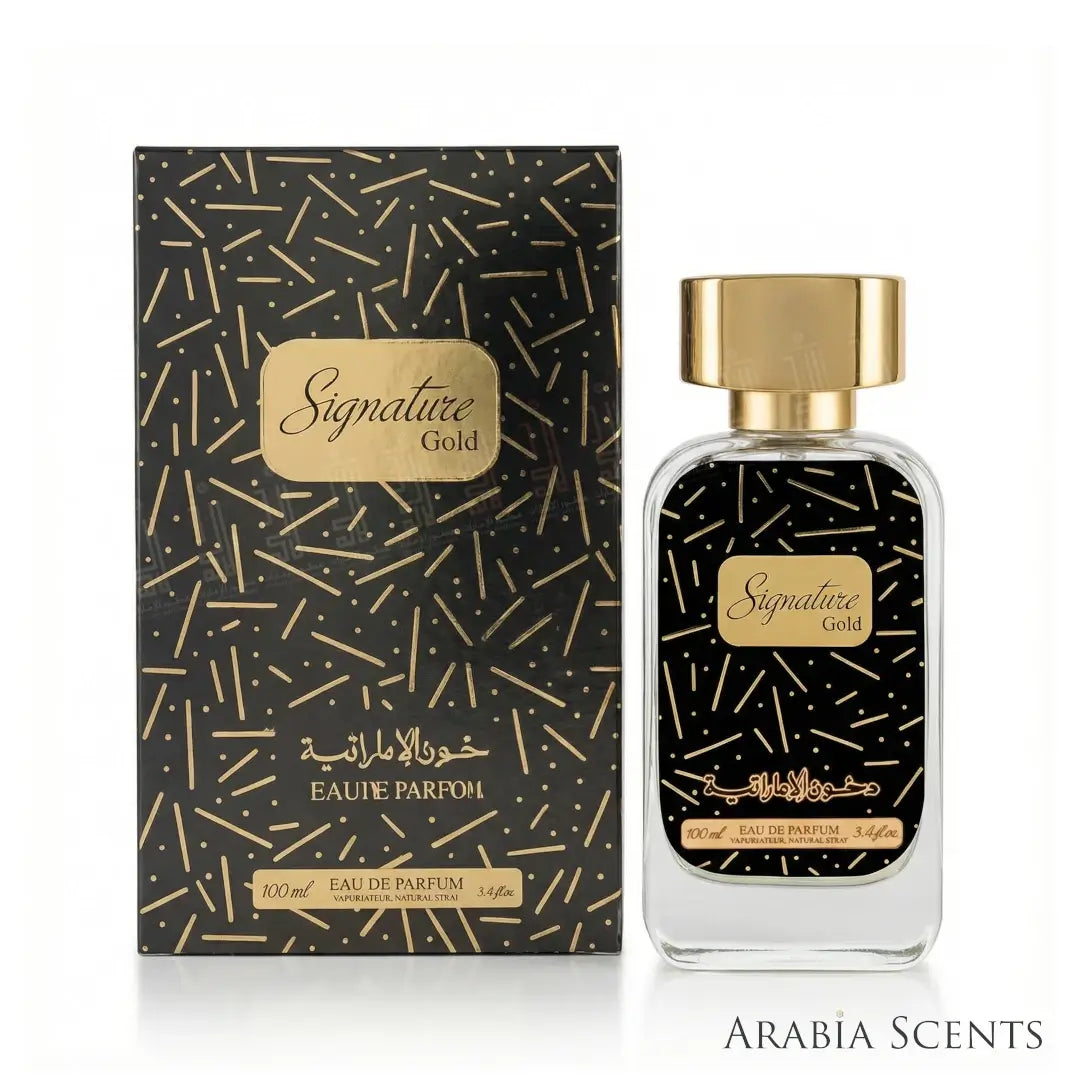 Perfume bottle and packaging of Signature Gold by Dkhoon Emirates on a white background featured on Arabia Scents
