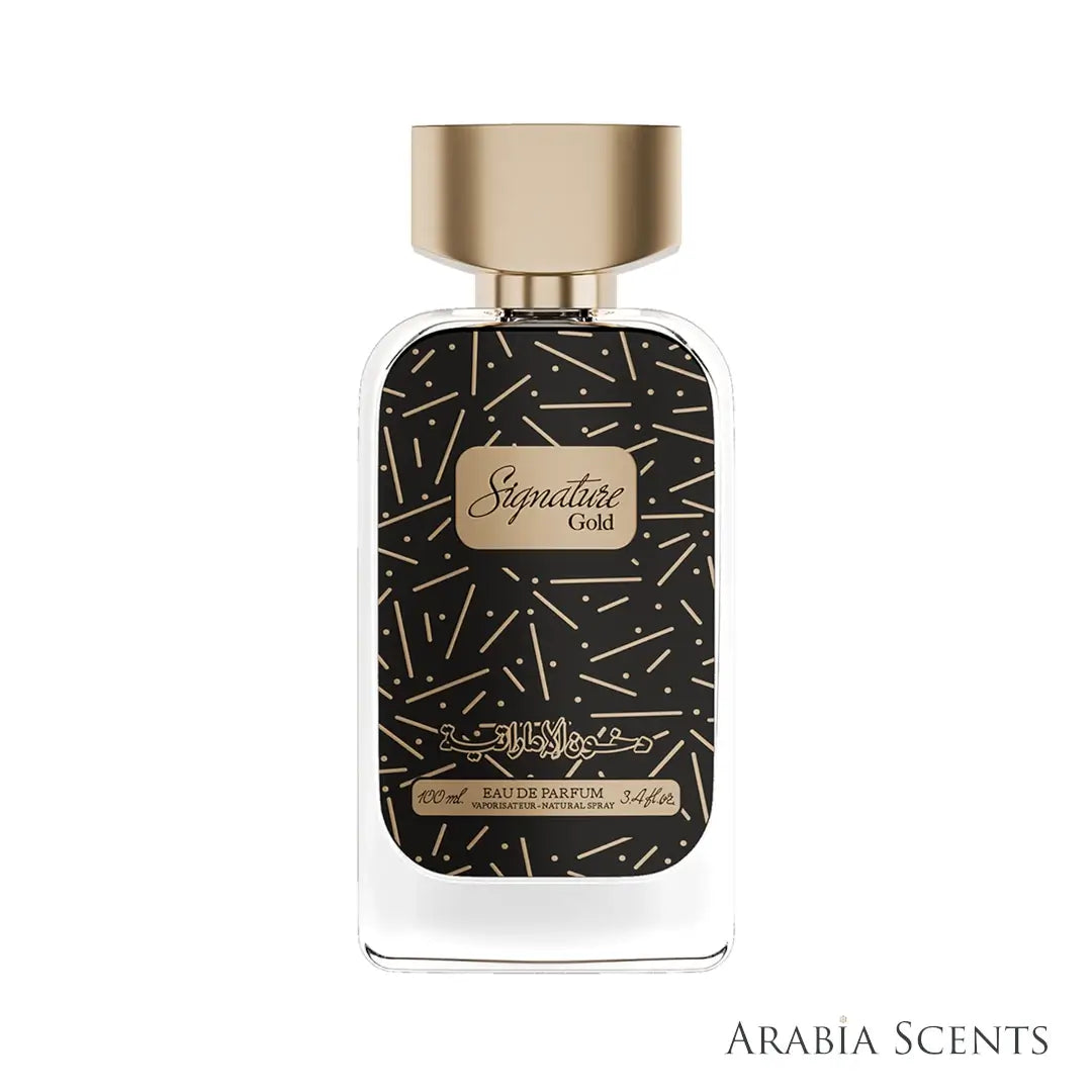 'Signature Gold' Perfume bottle with gold cap and black pattern on a white background branded Dkhoon Emirates featured on 'Arabia Scents'