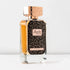 Perfume bottle 'Signature Rose Gold' with 'Dkhoon AlEmaratia' branding on a white background