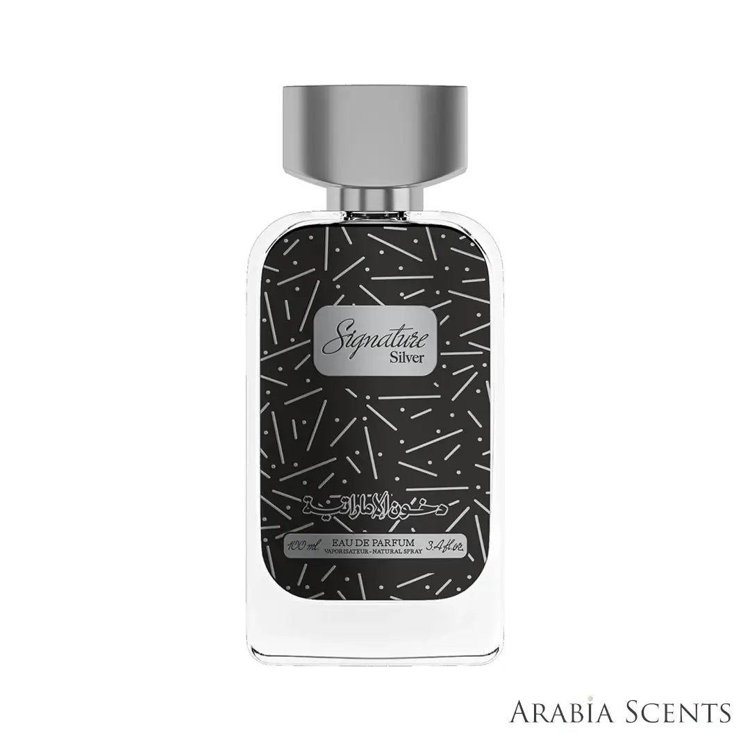 'Signature Silver' Perfume bottle with black and white design on a white background by Dkhoon Emirates featured by 'Arabia Scents' branding.