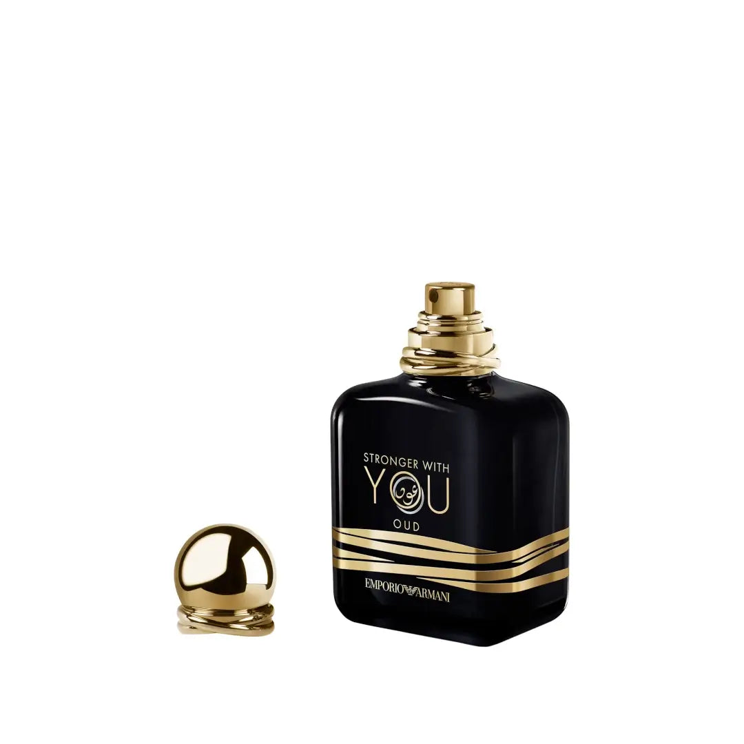 Black and gold 'Stronger With You Oud' perfume bottle by Emporio Armani on a white background