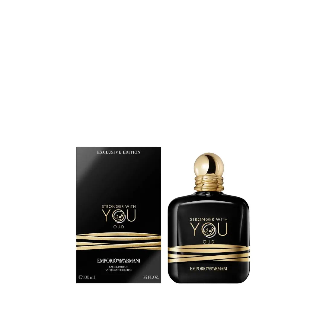 'Stronger With You Oud' black and gold perfume bottle and packaging by Armani on a white background