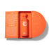 Orange bottle with packaging labeled 'Tango' on a white background by Gissah Perfumes