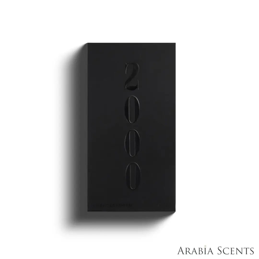'The Roots 2000' perfume packaging on a white background with 'Ahmed Al Maghribi' branding featured by 'Arabiascents'