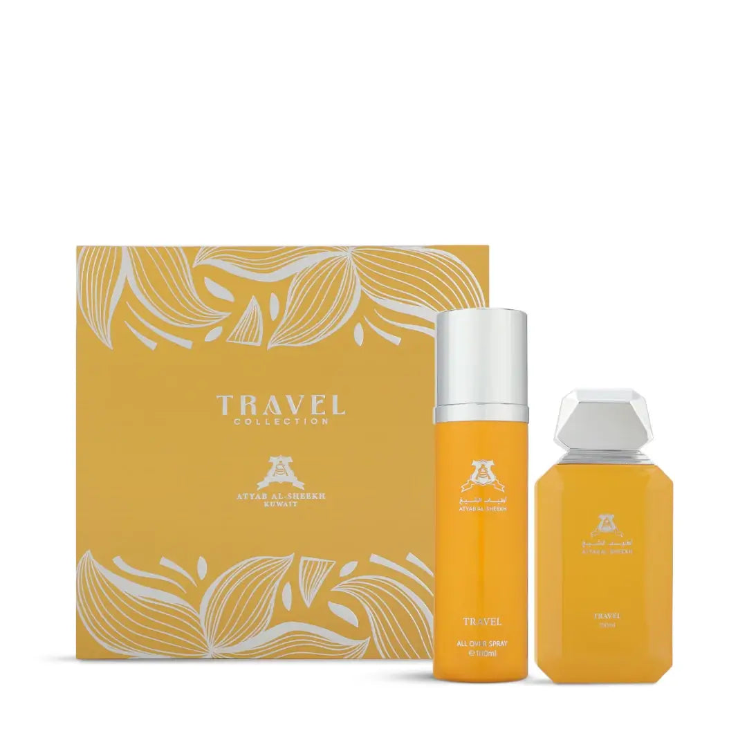 Orange travel-sized bottles with silver caps next to a yellow box labeled 'Travel Collection' by Atyab Al Sheekh on a white background.