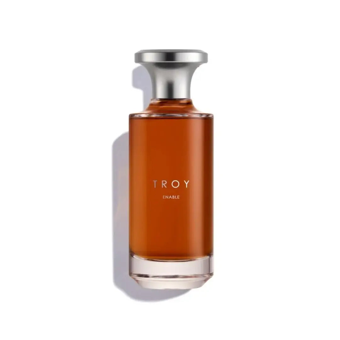 'Troy Enable' perfume bottle on a white background with 'Assaf' branding