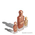 Elixir De Bronze perfume set by IBRAQ on a white background featured by 'ArabiaScents'
