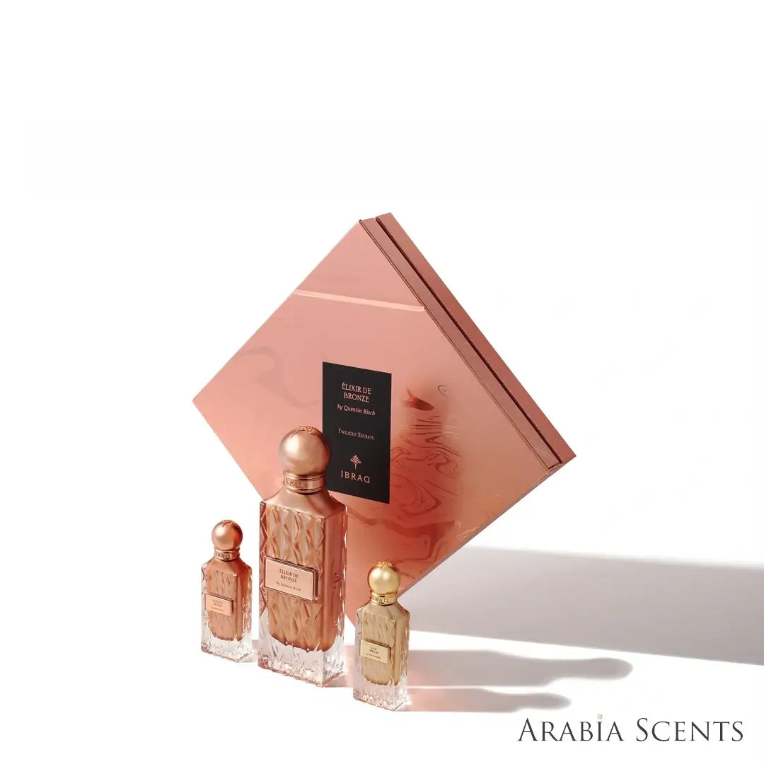 Elixir De Bronze perfume set elegant packaging by IBRAQ on a white background featured by 'ArabiaScents'