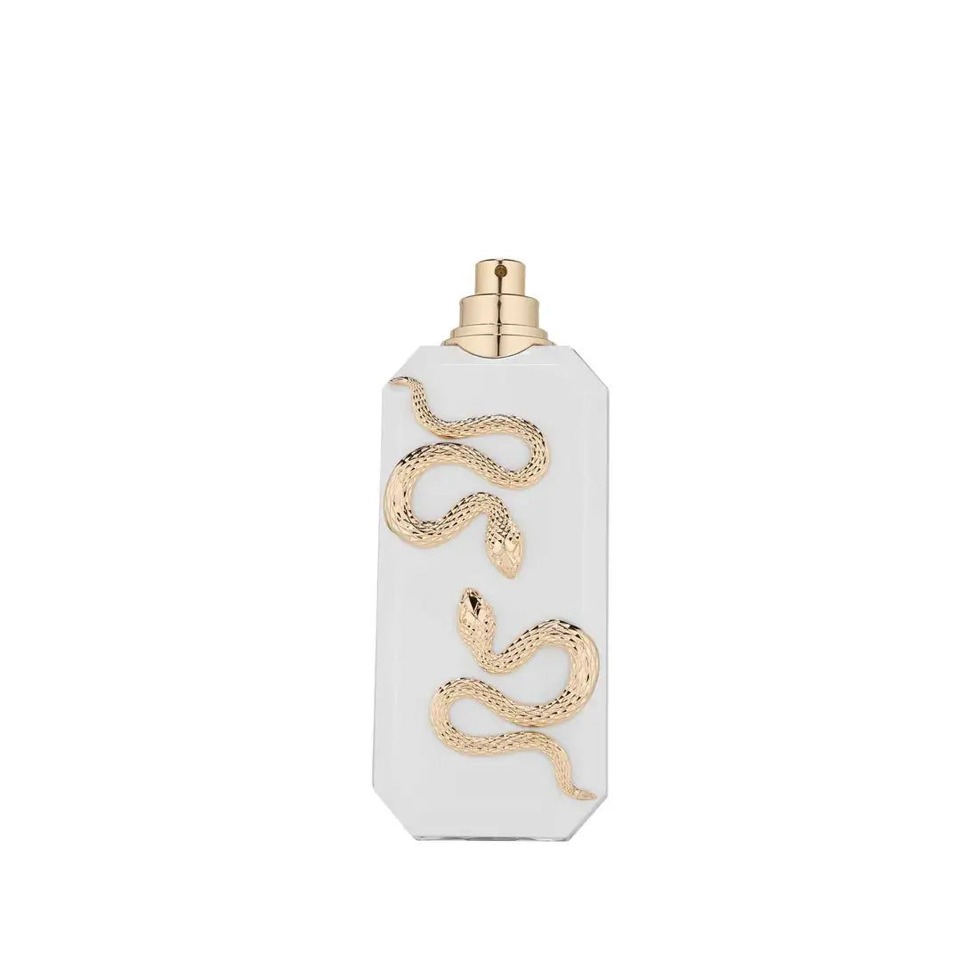 Veneno Bianco Perfume bottle with gold snake design on a white background by French Avenue