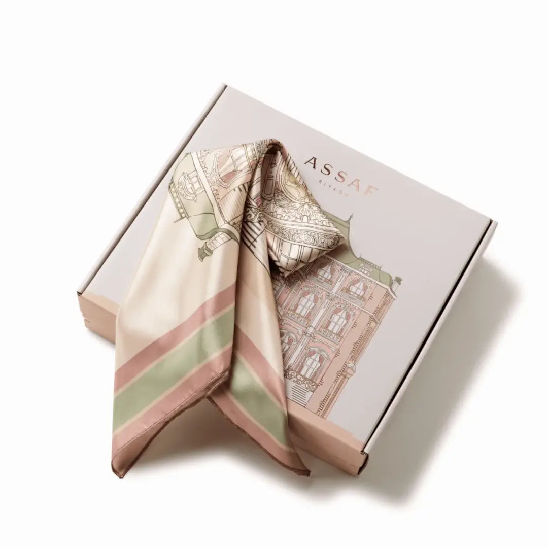 Decorative scarf with architectural design on a matching box, featuring the brand 'Assaf' presenting 'Victorian Collection' perfume set
