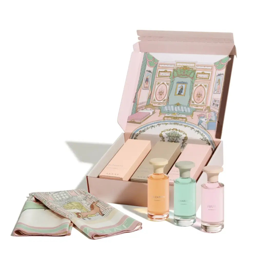 'Victorian Collection' by Assaf Perfume set with pastel-colored bottles and a decorative box on a white background