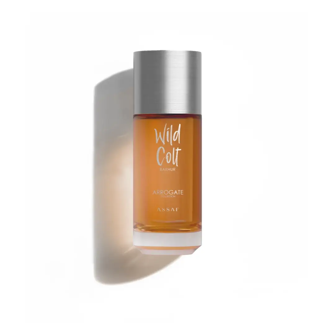 Perfume bottle labeled 'Wild Colt Bakhur' by Assaf on a white background
