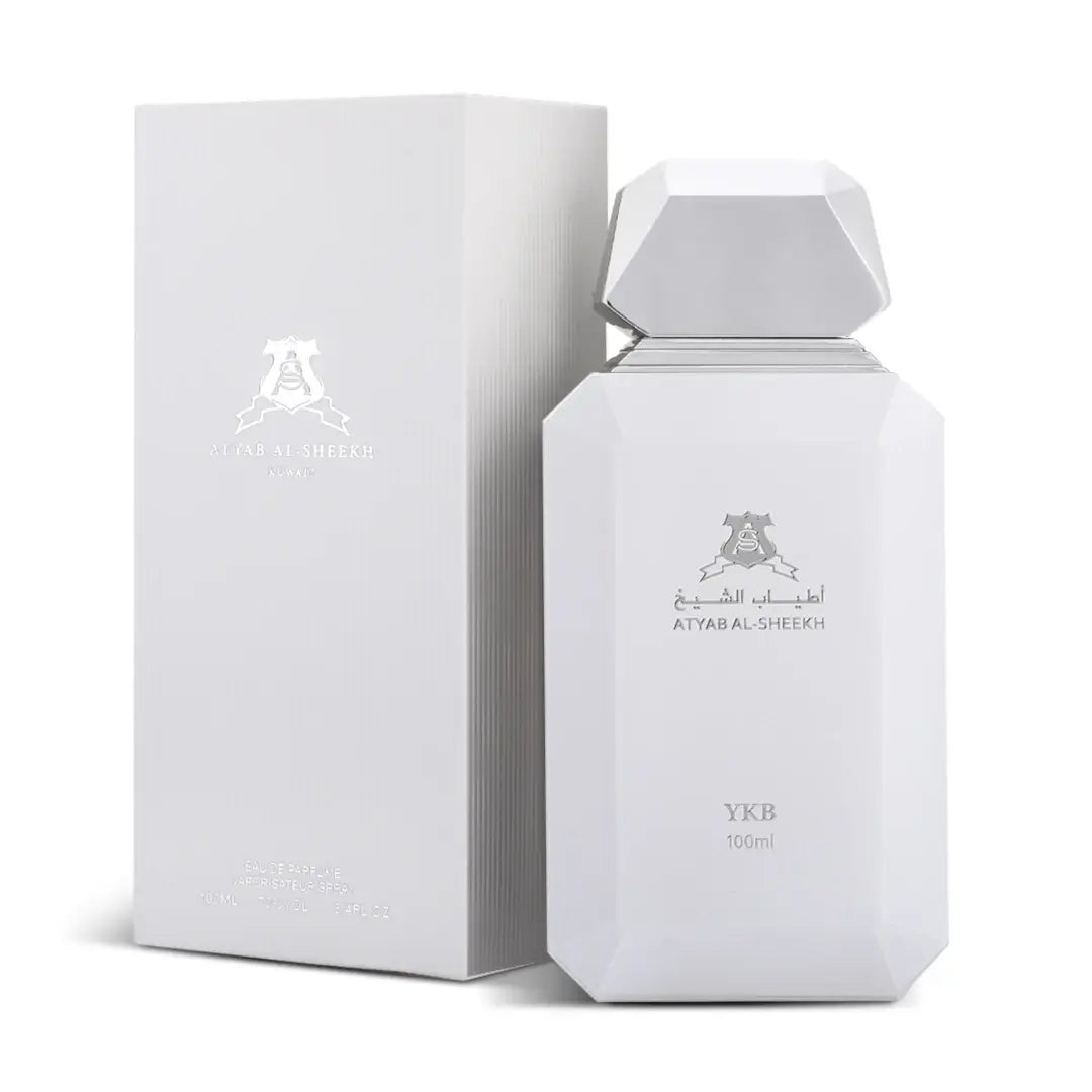 'YKB White' perfume bottle & packaging on a white background with 'Atyab Al Sheekh' branding