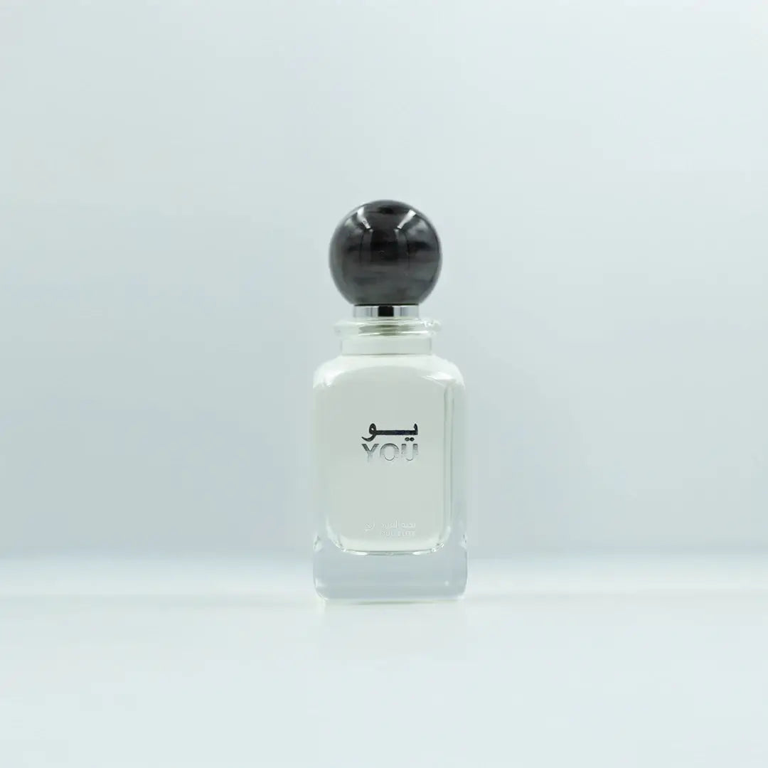 'You' perfume bottle with black cap on a white background with 'Oud Elite' branding